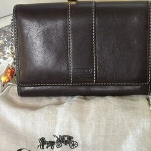 Coach Snap Bifold Wallet with Vintage Star Bag Charm.